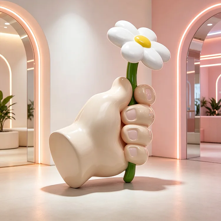 Hand Holding Flower Sculpture
